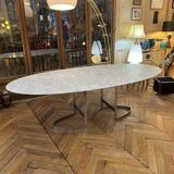 Oval table designed by Vittorio Introini, published by the Fratelli house.