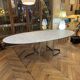 Oval table designed by Vittorio Introini, published by the Fratelli house.
