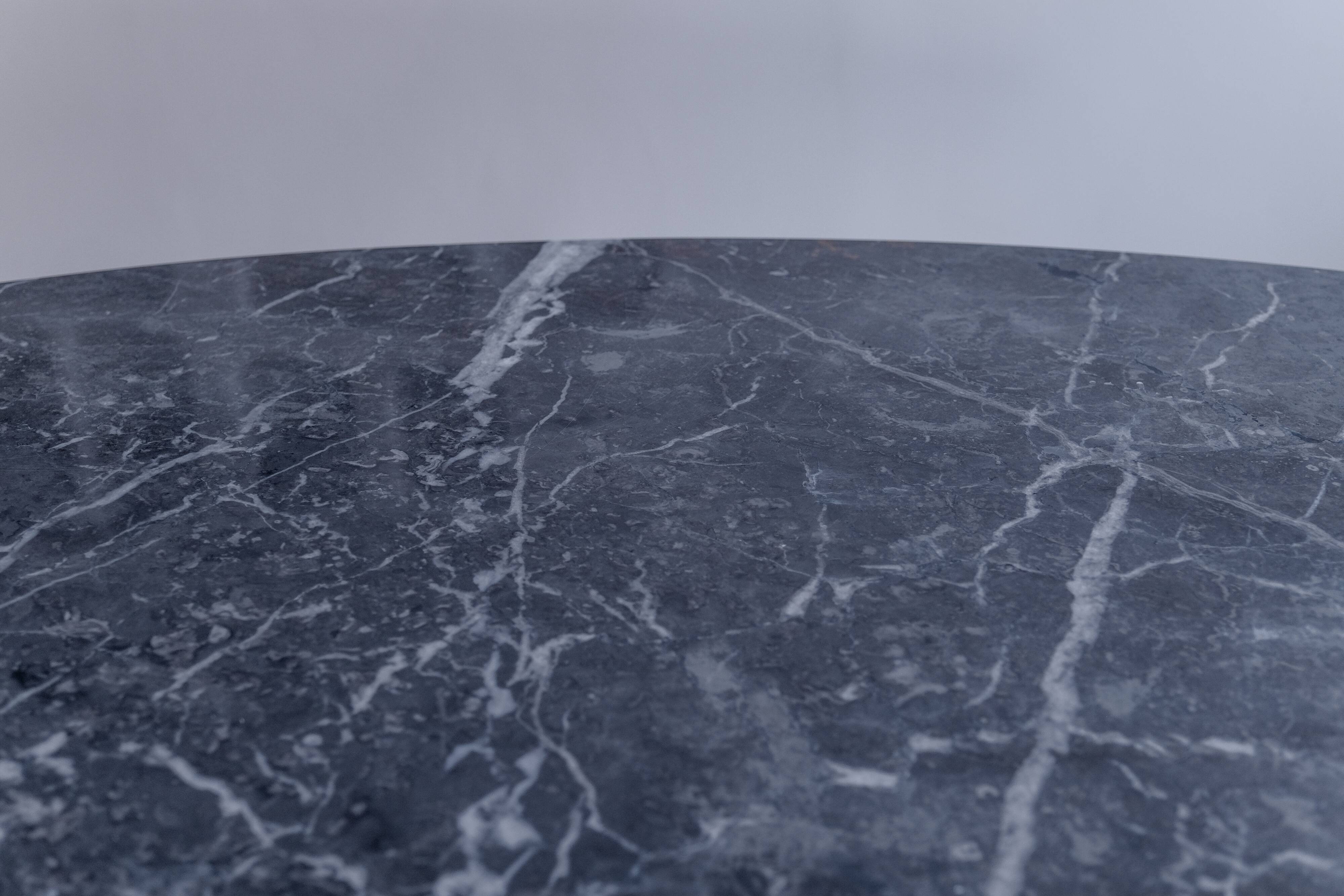 Oval dining table in grey marble Emperador