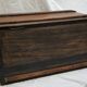 Former wooden travel trunk