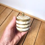 Small round box in mother-of-pearl and brass
