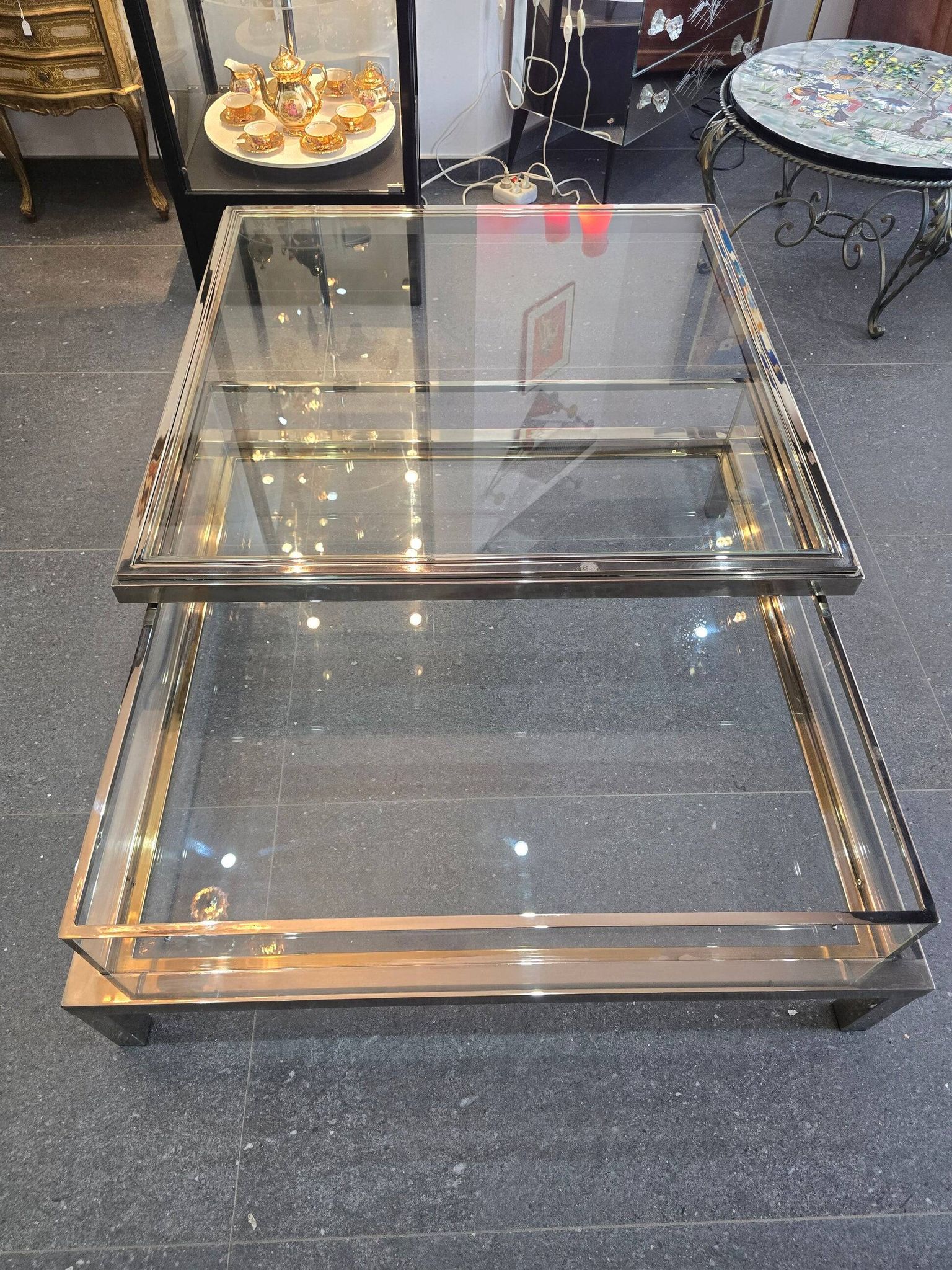 Sliding top coffee table – 70s design – chrome & glass – 108 cm