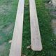 Pairs of large benches in raw fir wood.