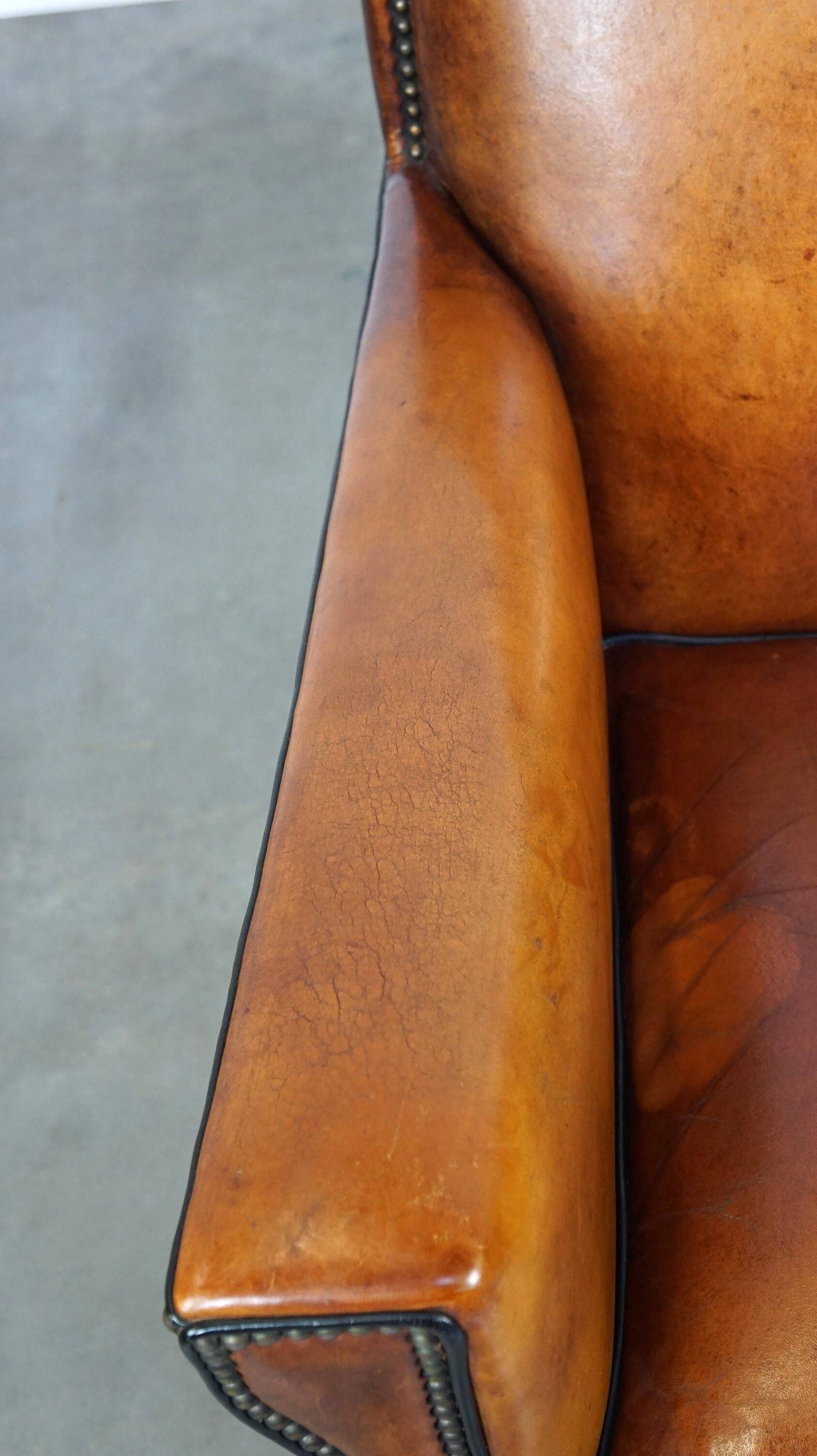 Sleek sheepskin Art Deco design armchair with beautiful details