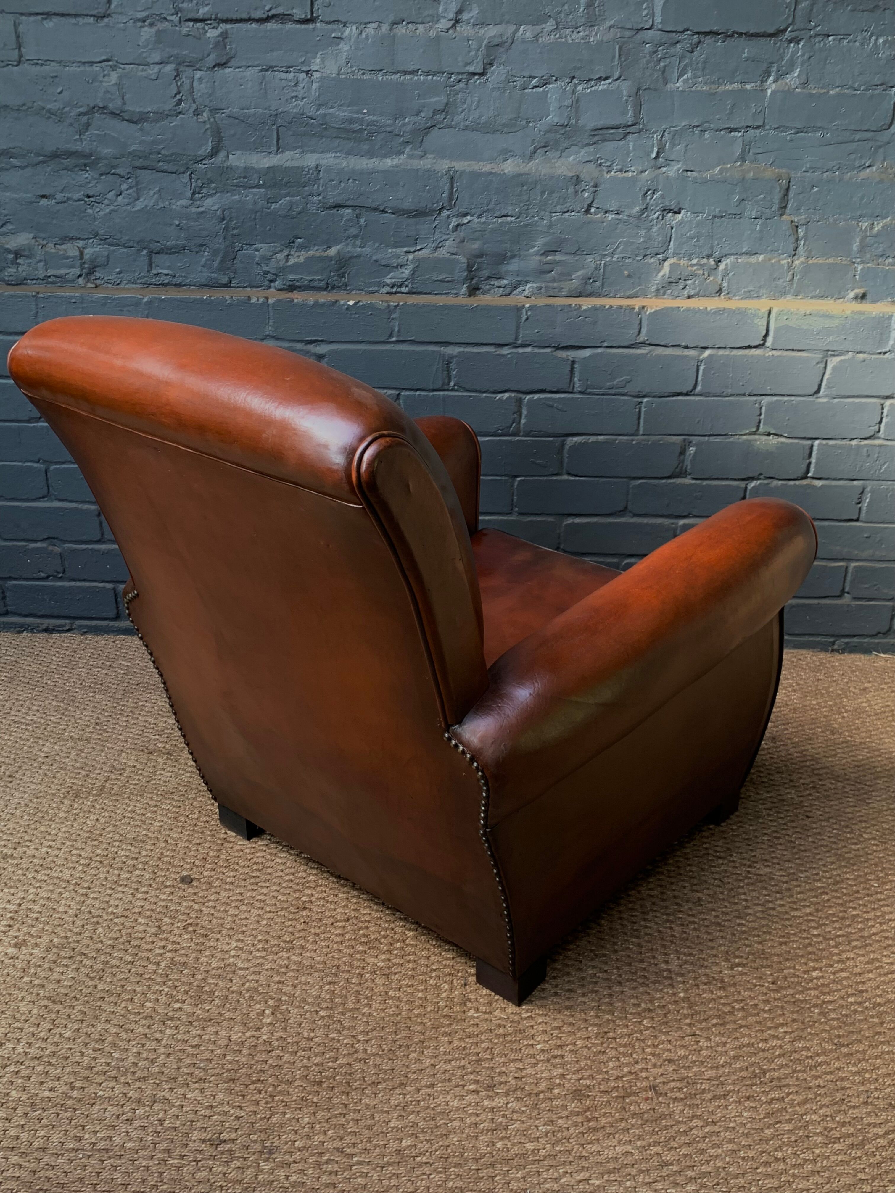 French, leather club chair, havana lounge model circa 1950's