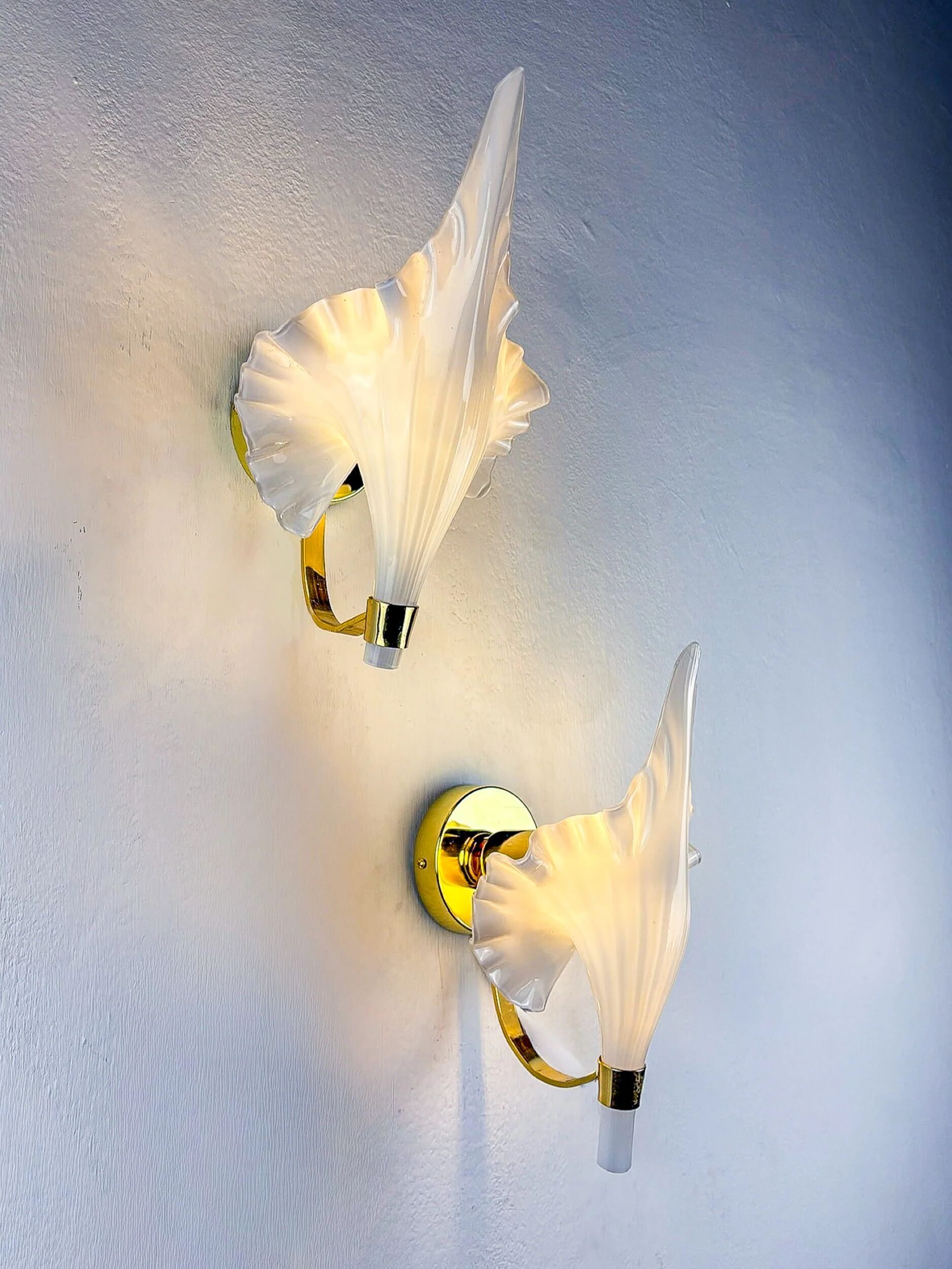 Pair of "Calla Lily" leaf-shaped wall sconces, Murano glass & gilt brass, circa 1970, Italy