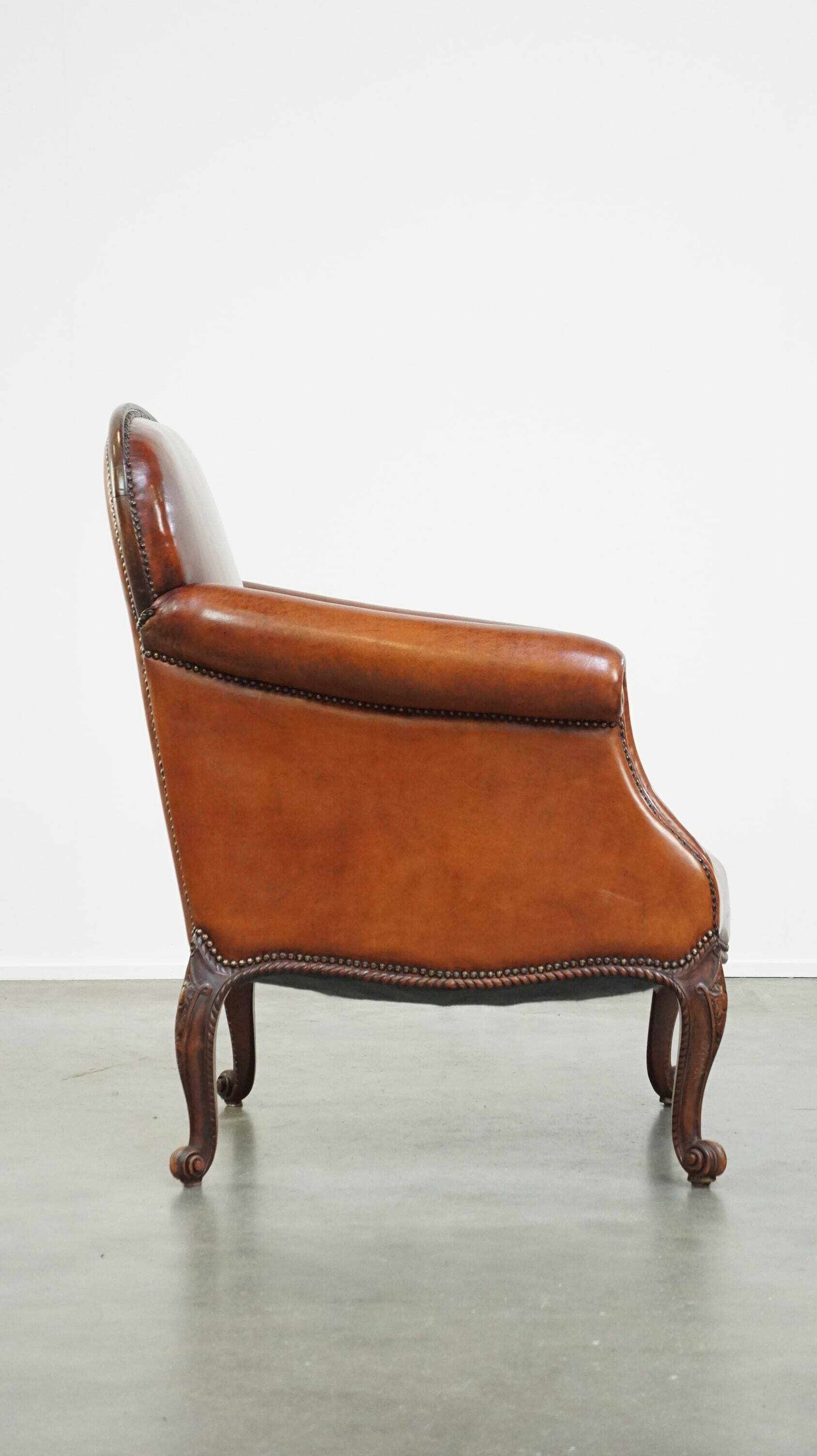 Fully restored antique sheepskin armchair