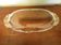 Vintage serving dish in transparent glass and molded borders in opaque glass with gilding