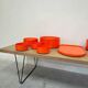 Vintage “Max” orange plastic dinnerware set 1964