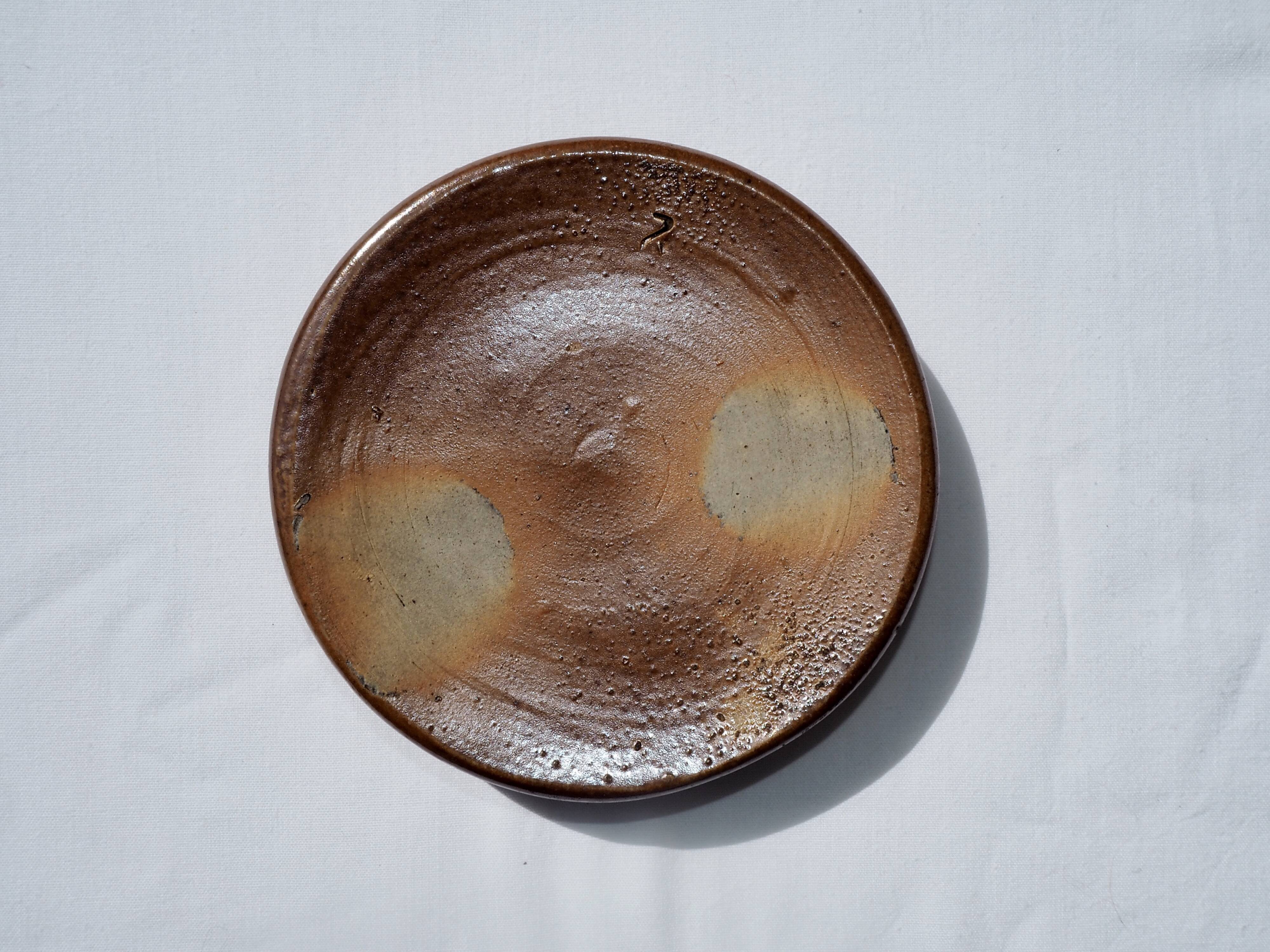 Trio of stoneware pots with lids