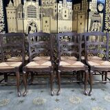 Suite of 8 rustic mulched chairs with crisscross