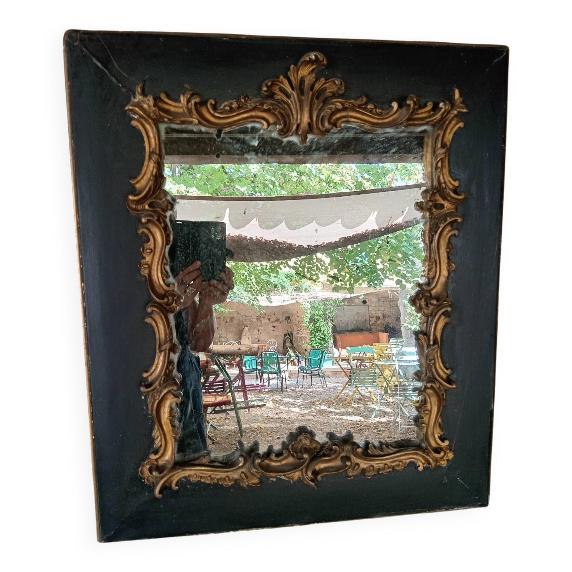 Antique mirror in stucco and wood