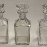 Portable Art Deco liquor cabinet in mahogany & metal with 3 Baccarat crystal bottles.