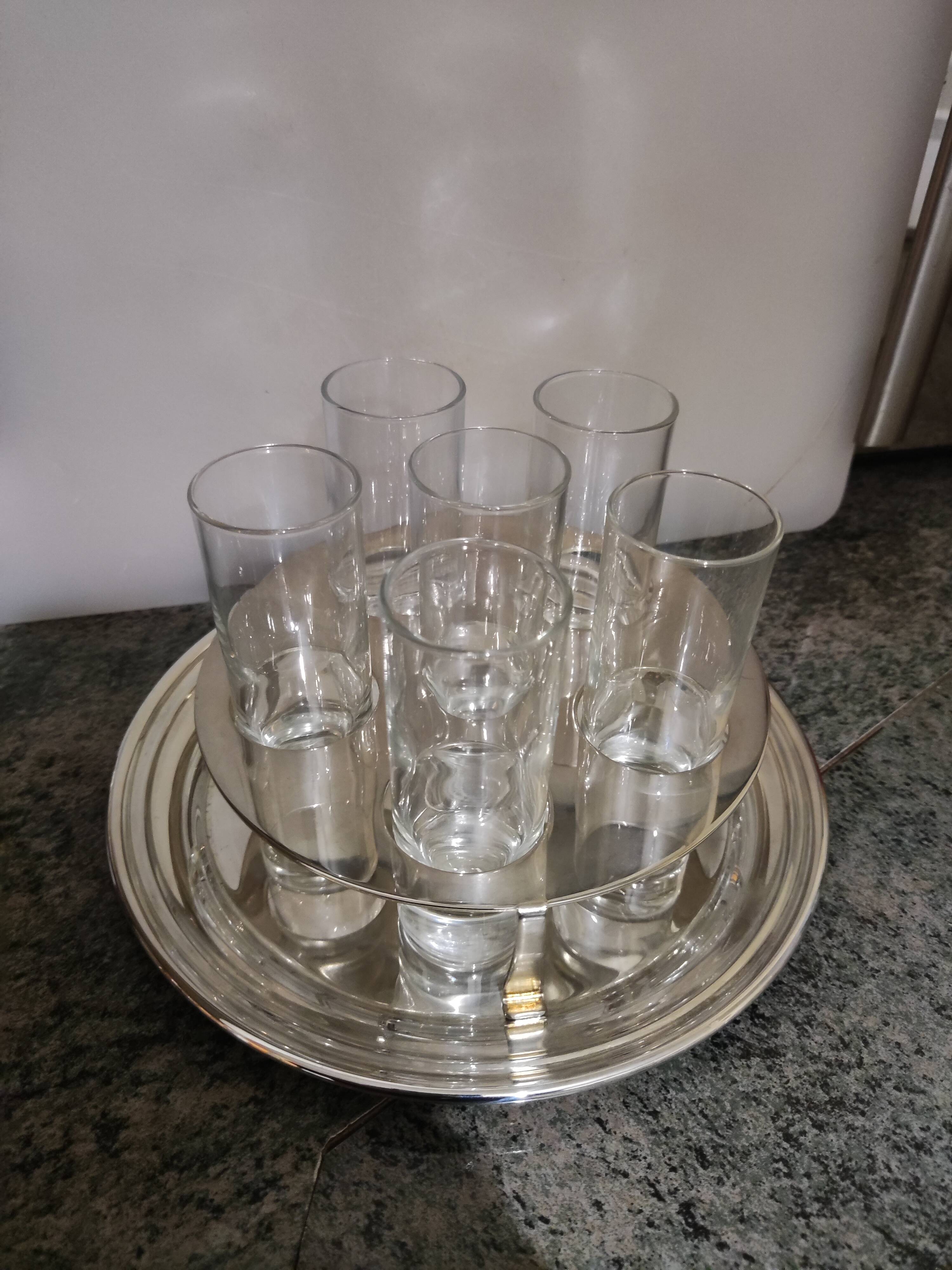Vodka service with its metal stand