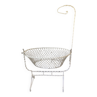 Twisted wrought iron cradle