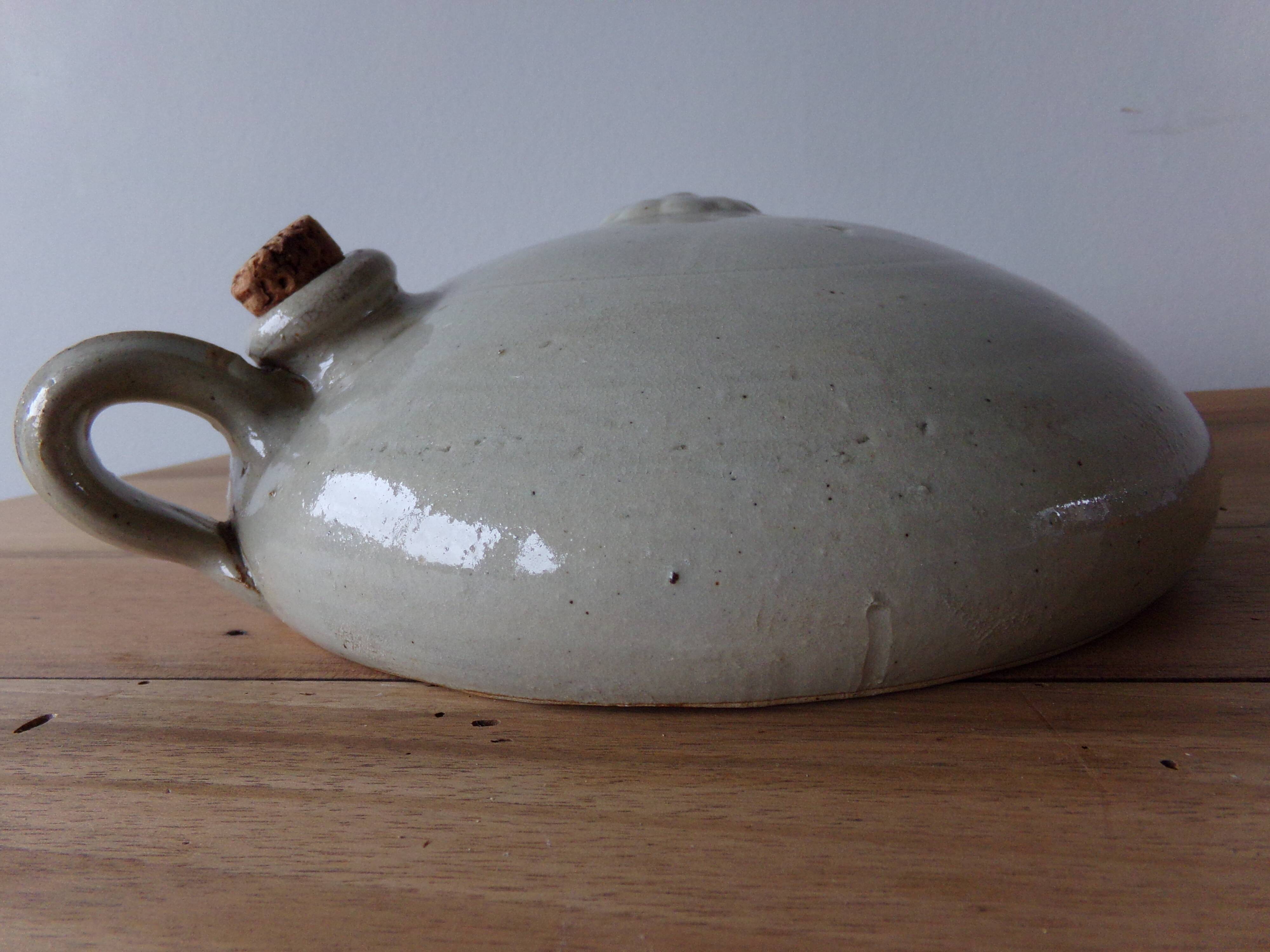 Old sandstone hot water bottle