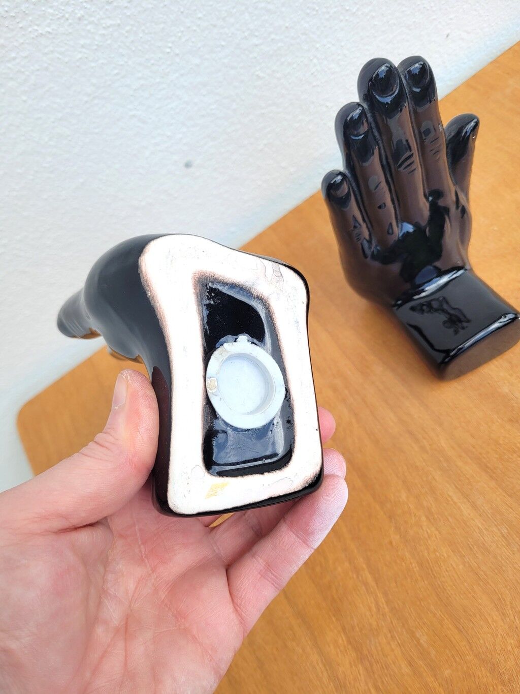 Pair of vintage black ceramic hand bookends