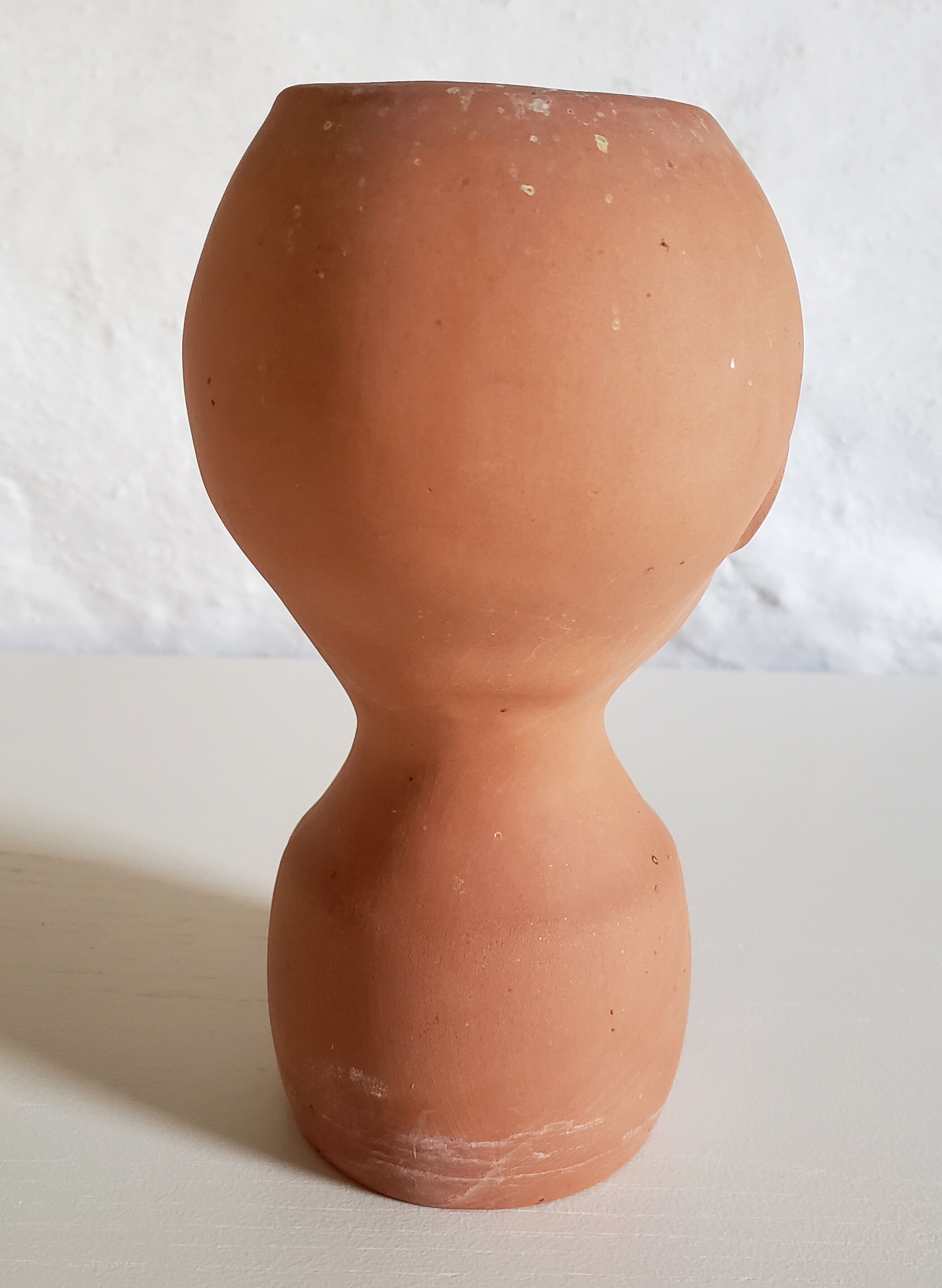 Terracotta pot cover baby head