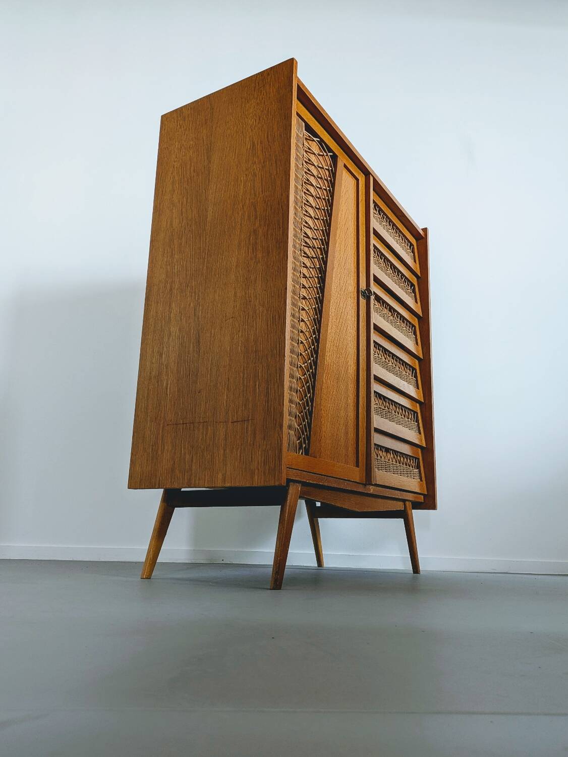 Vintage wooden and wicker chest of drawers