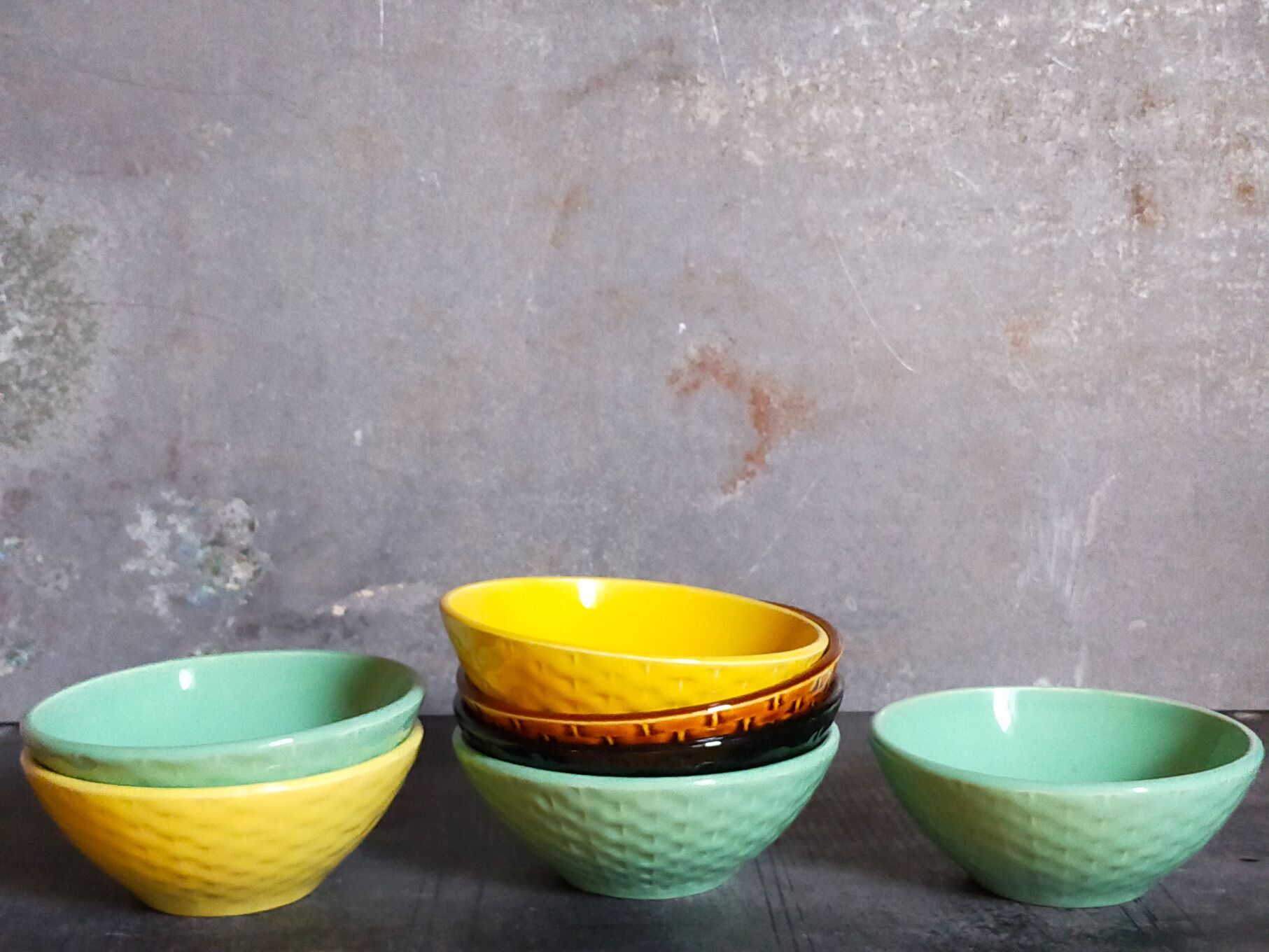 Seven vintage slip ceramic bowls