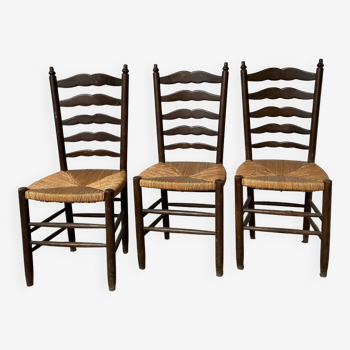 Trio of rustic oak straw chairs
