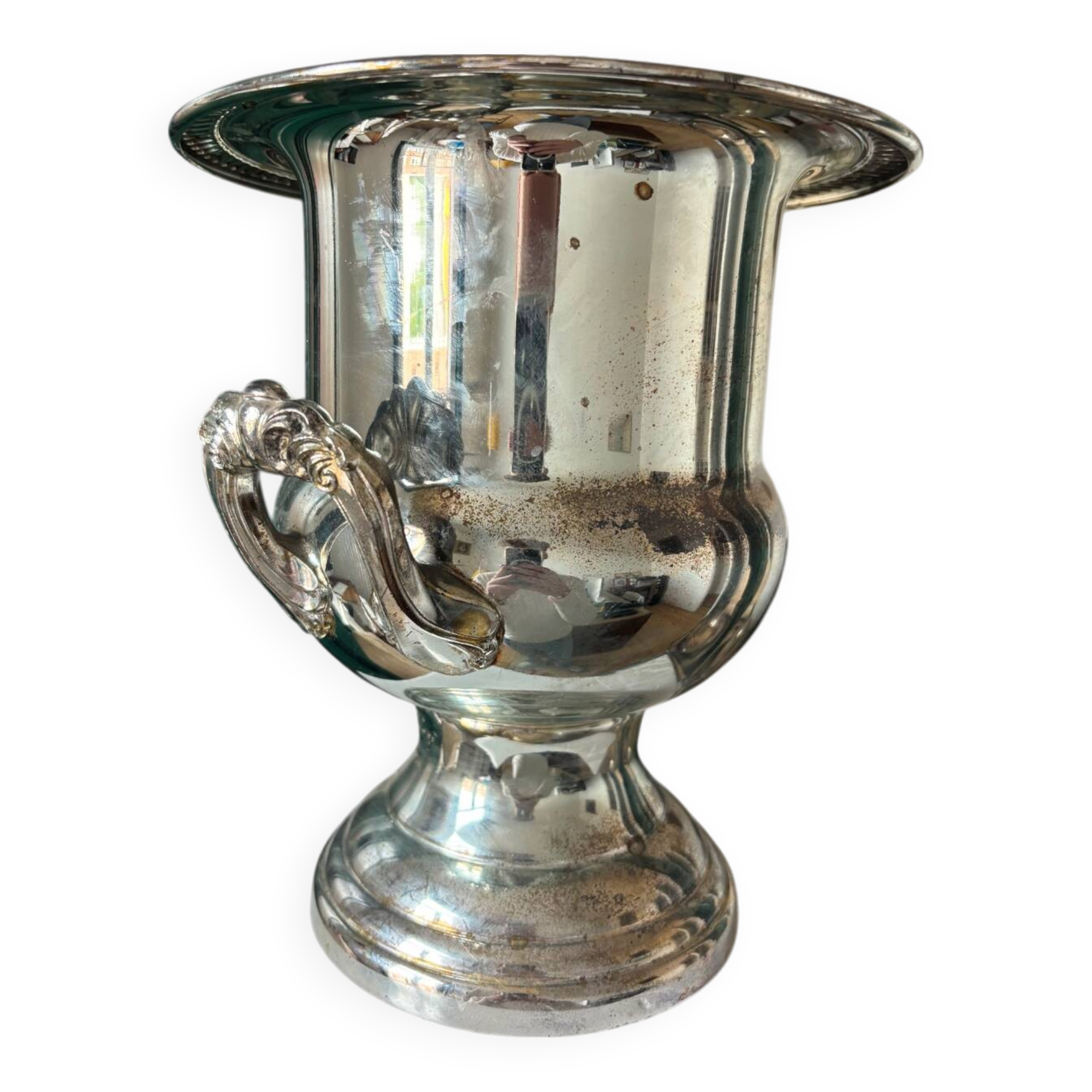 Silver metal champagne bucket.