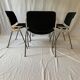 A set of four Castelli DSC 106 chairs, designed by G. Piretti, Italy, 90s