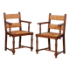 Pair of oak straw-seated armchairs from the 1950s.