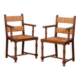 Pair of oak straw-seated armchairs from the 1950s.