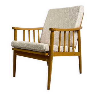 Reupholstered Scandinavian type oak armchair, origin Eastern Europe, 70s-80s
