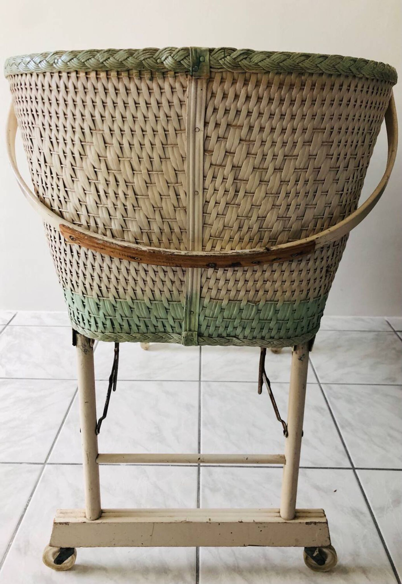 Wood and wicker cradle from the 1950s.