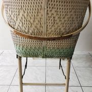 Wood and wicker cradle from the 1950s.