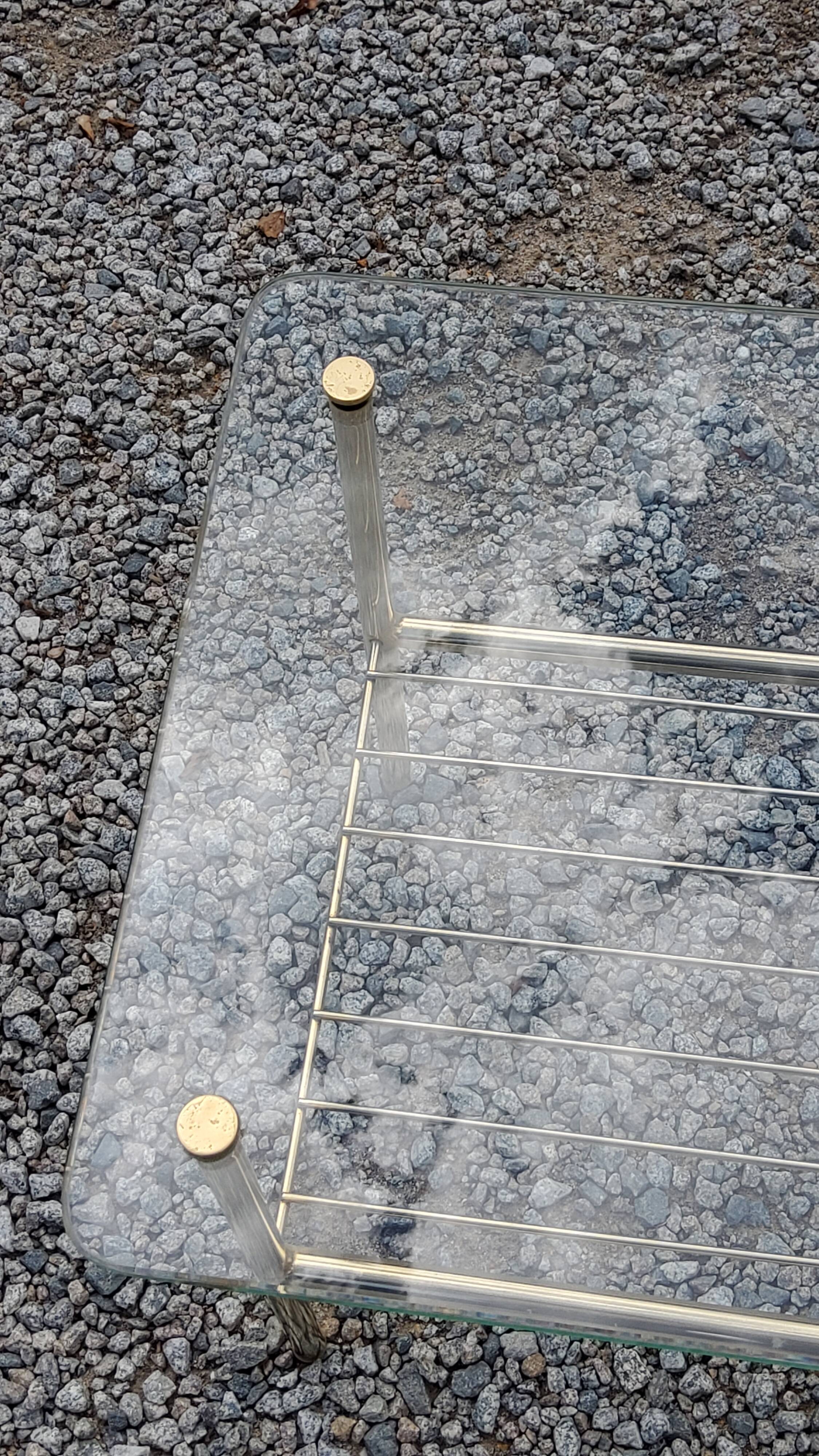 Coffee table from the 60s top glass base metal gilded
