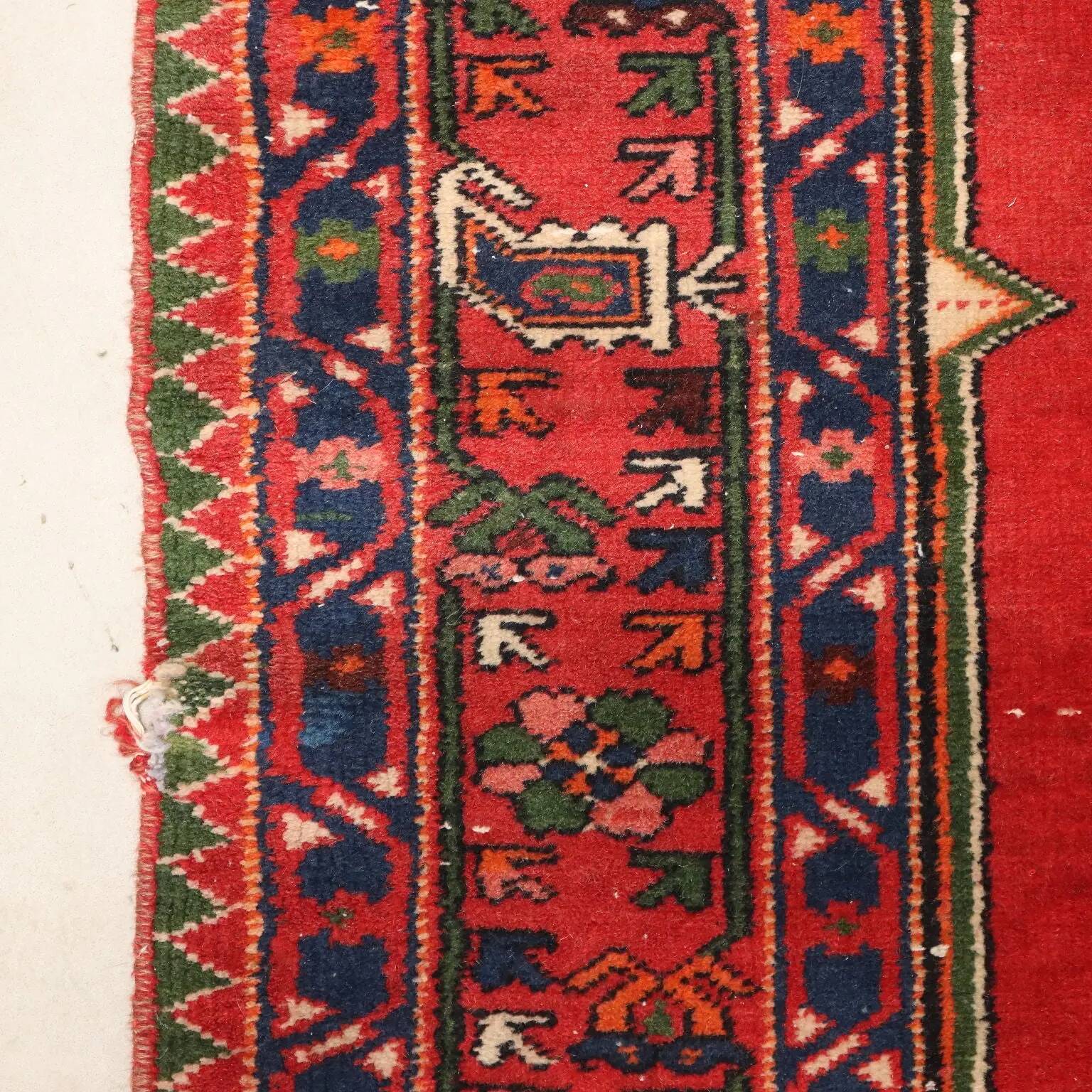 Ancient Asian rug made of cotton and wool, large knot.