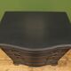 Antique black painted serpentine bachelors chest of drawers