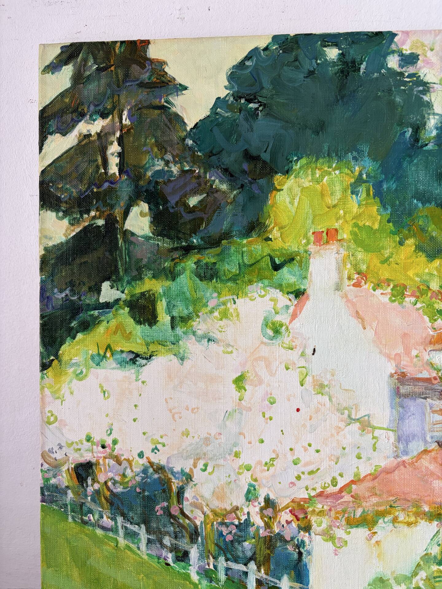Village with pink roofs, oil on canvas signed Claude Jousset.