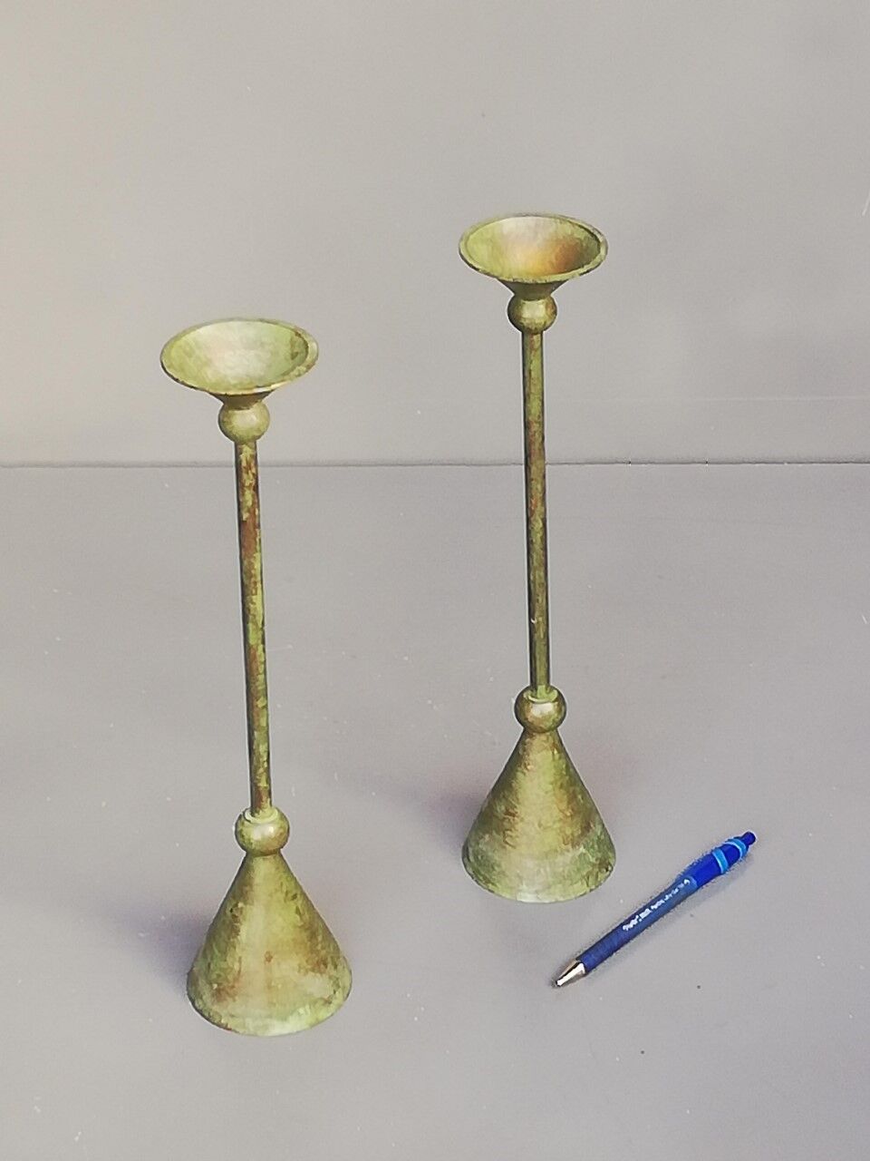 Pair of bronze patina metal candlesticks