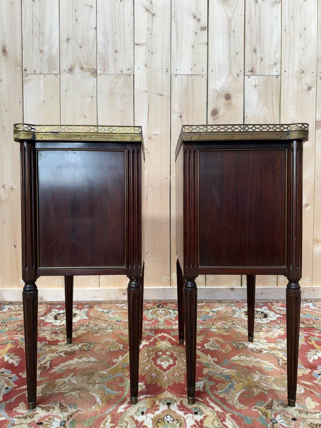 Pair of Louis XVI bedside tables in solid mahogany.