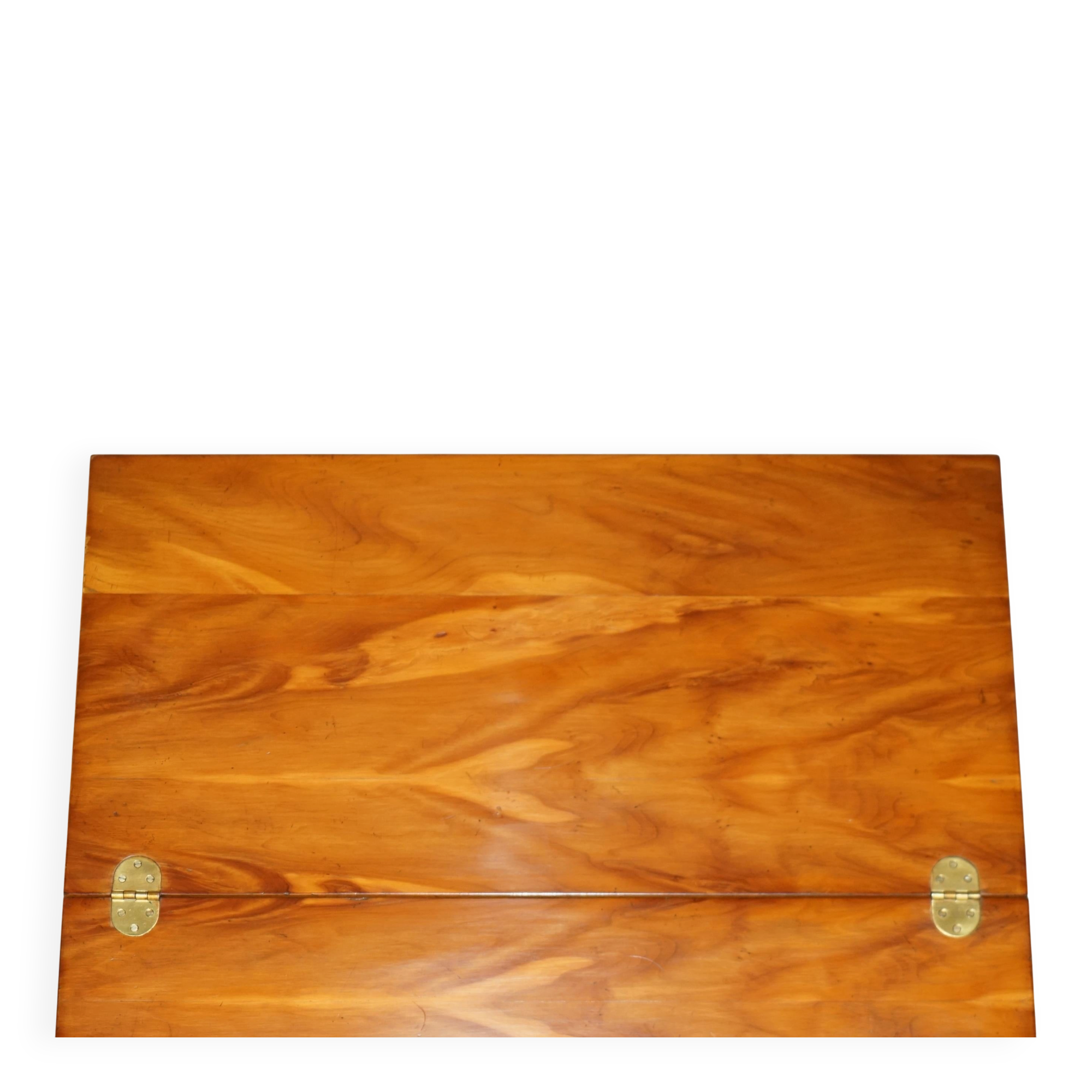 Vintage walnut commode with sliding top in Butler style.