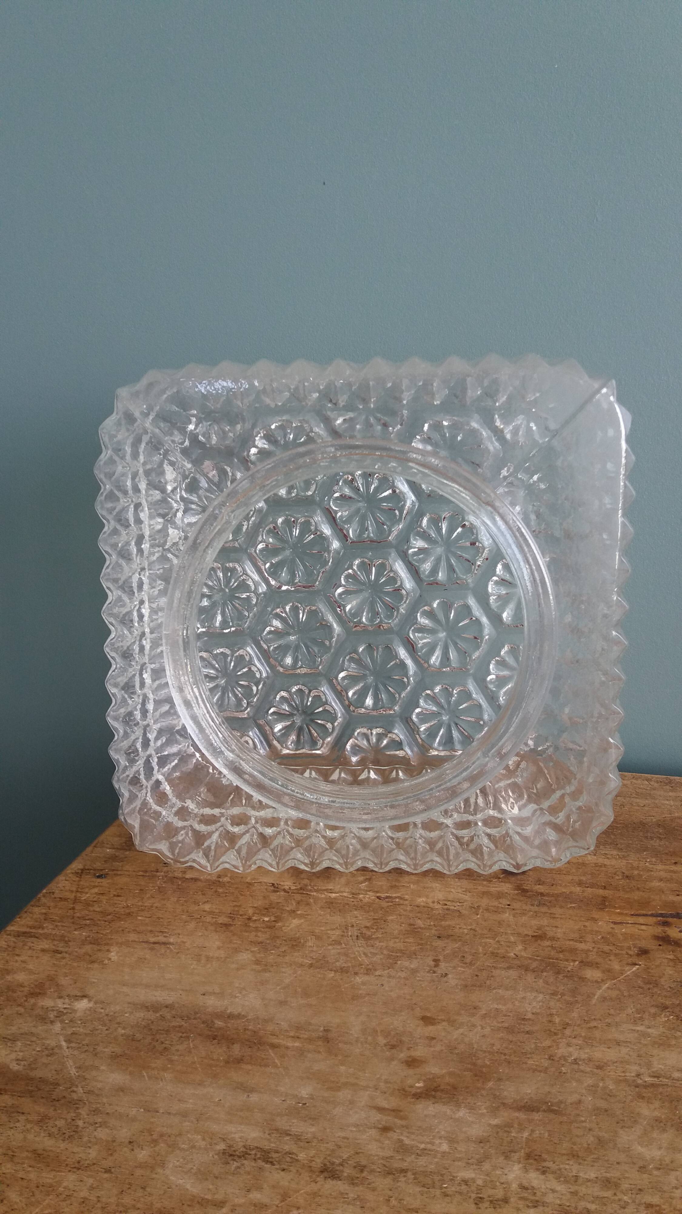 Square globe ceiling light in moulded glass.