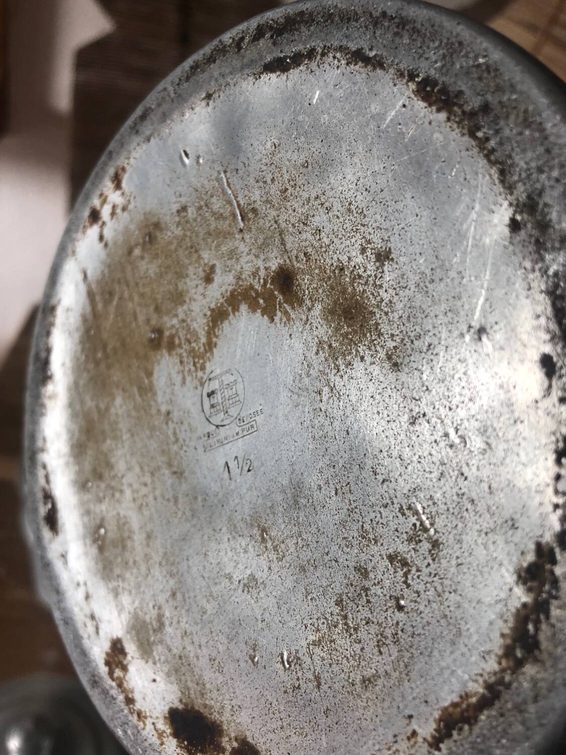 Old aluminum coffee maker, woven wicker handle