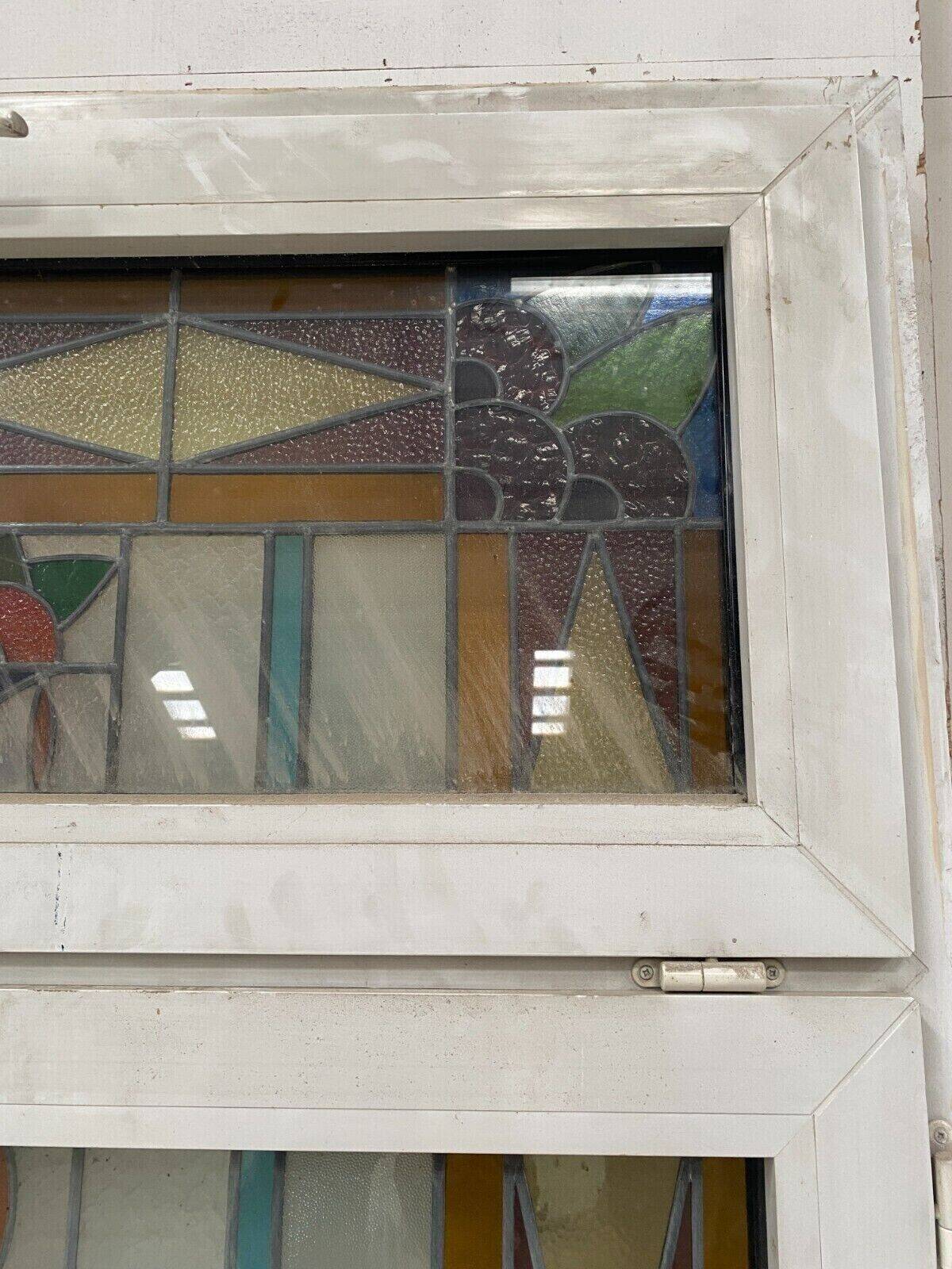 Pair of two-leaf windows in 20th century Art Deco stained glass