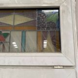 Pair of two-leaf windows in 20th century Art Deco stained glass