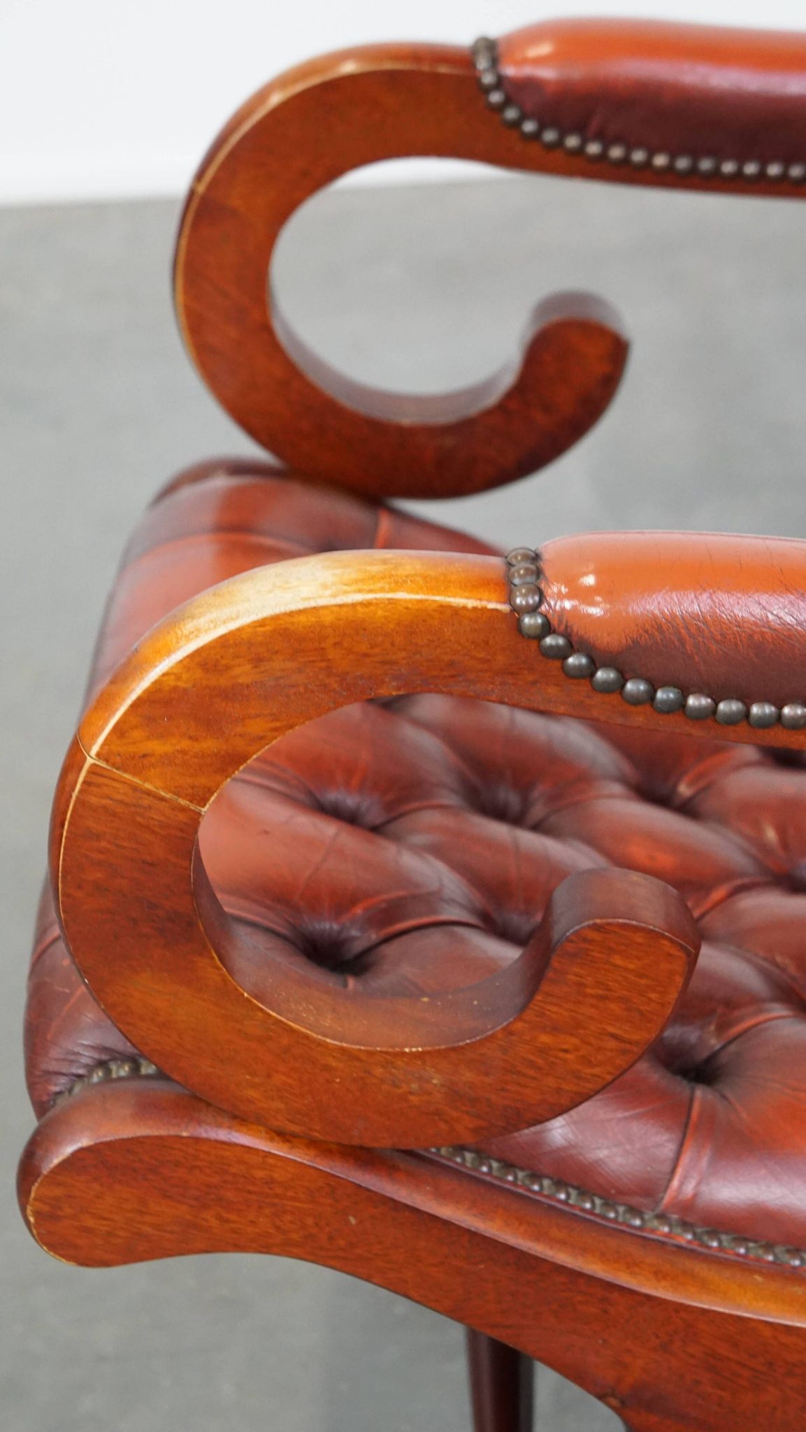 Red cowhide leather English Chesterfield armchair combined with wood