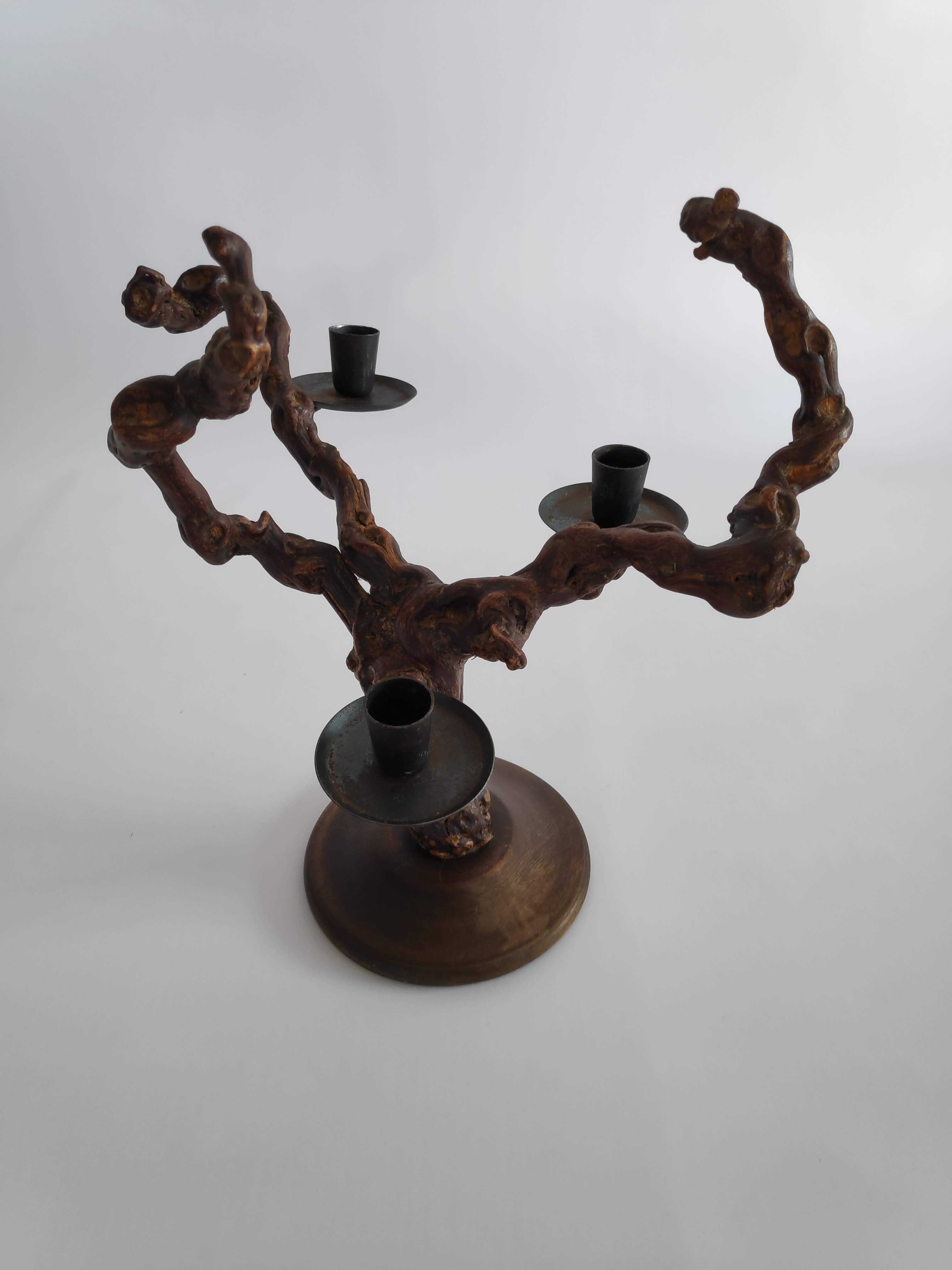 Vintage candlestick in vine shoots of the years 70
