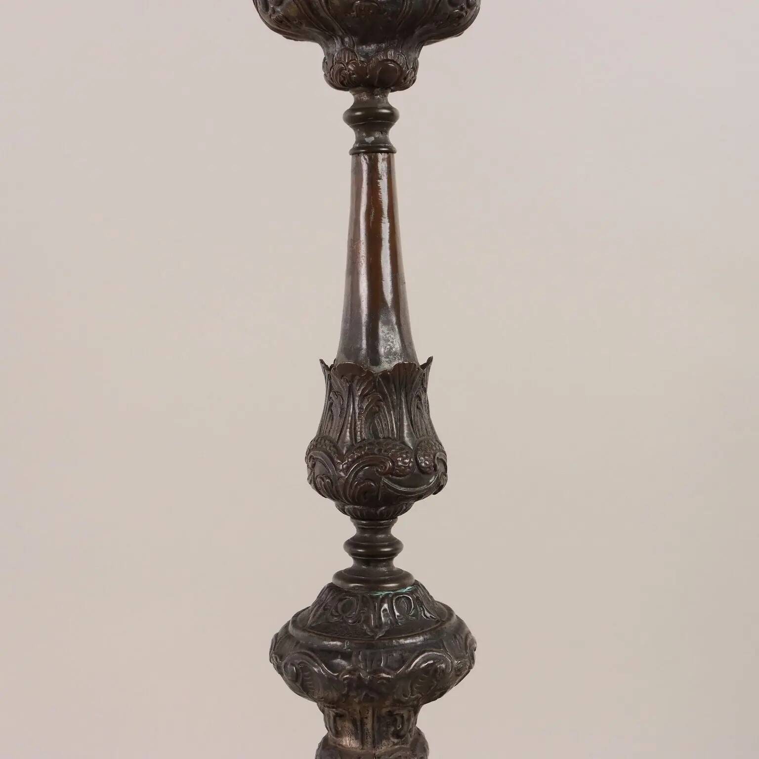 Antique candelabrum converted into a lamp, 18th-19th century.