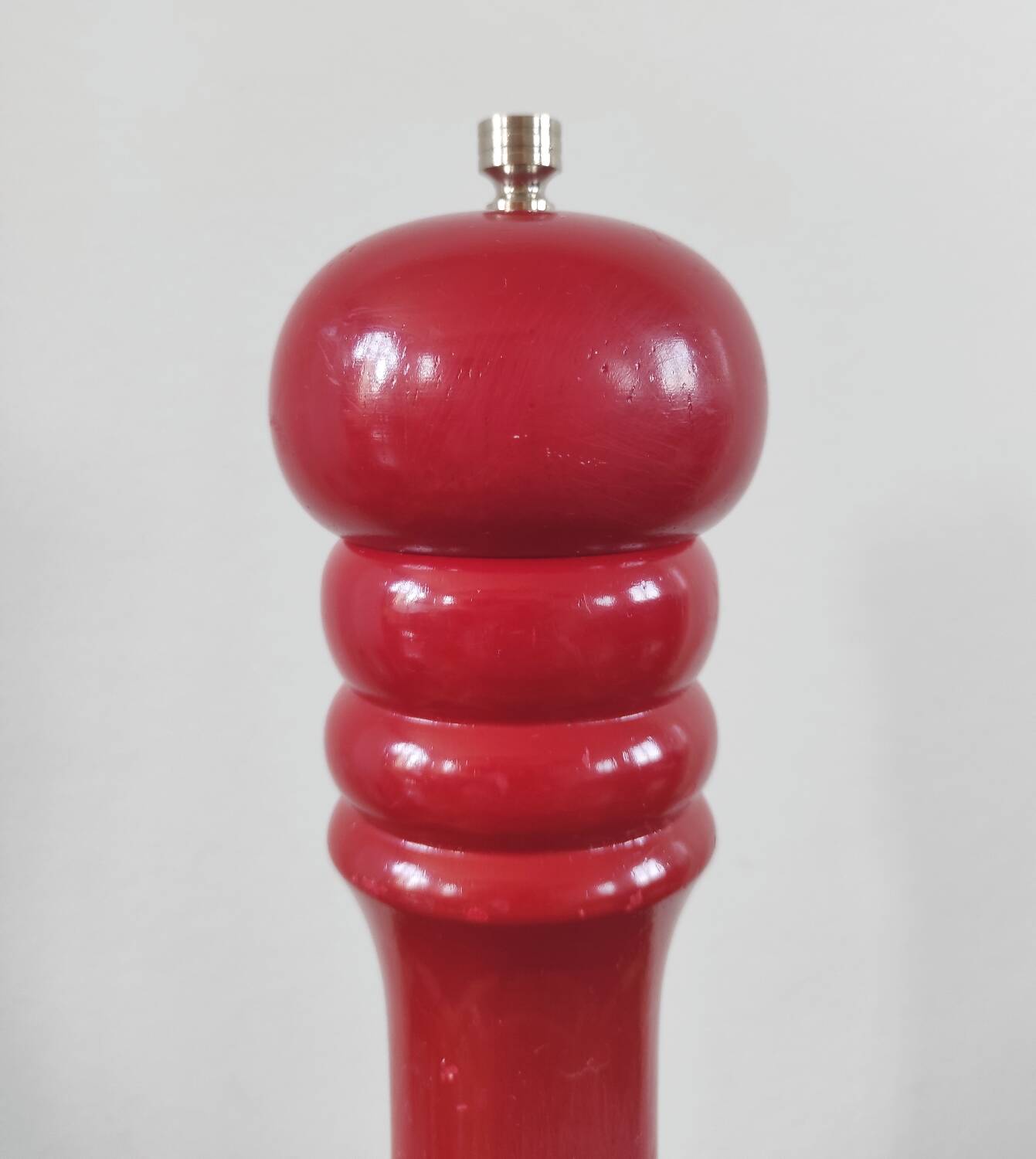 Giant vintage red lacquered wooden pepper mill