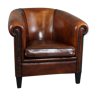 Fauteuil club en cuir de mouton avec passepoil et clous noirs