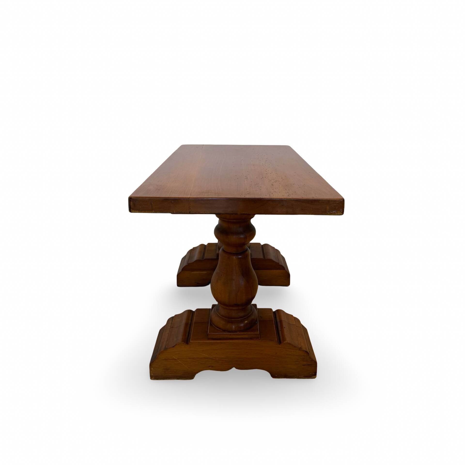 A small, rustic walnut wooden table, crafted from solid walnut wood, 1