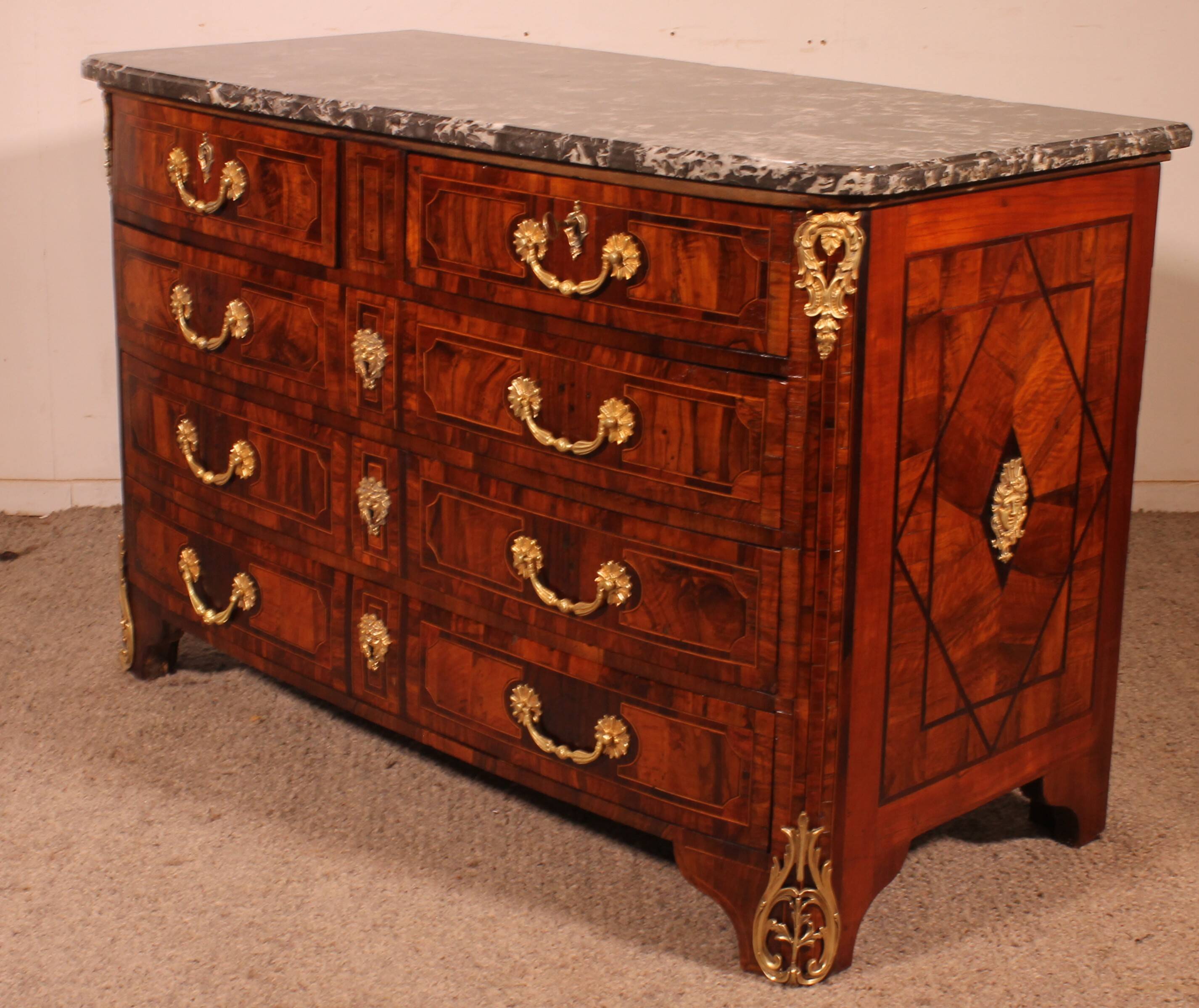 Dauphiné commode from the Louis XIV period in olive wood marquetry.